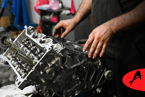 accurate automotive transmission rebuild vs replacement